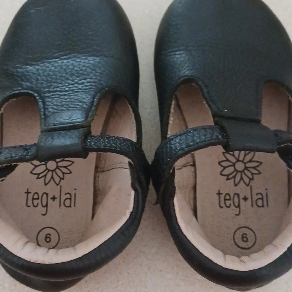 Teg+Lai  T Strap Black Rubber Flex Sole Shoes